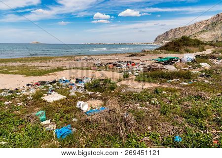Coastal Degradation With Dirty Beach, Rubbish And Domestic Waste Polluting The Capaci Beach In Provi