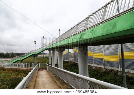 Elevated Pedestrian Crossing From The Inside. Safe Passage Across The Road
