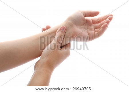 Woman Checking Pulse On Wrist Against White Background, Closeup