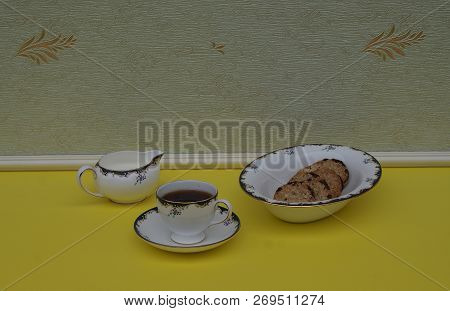 English Teacup With Saucer, Cream Jug And A Cake Bowl With Cookies, Fine Bone China Porcelain