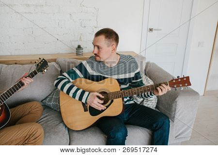 Learning To Play The Guitar. Interesting Hobby Or Professional Occupation Of Music. Music Education 