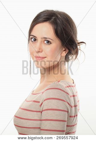Smiling Young Brunette Standing Side To Camera