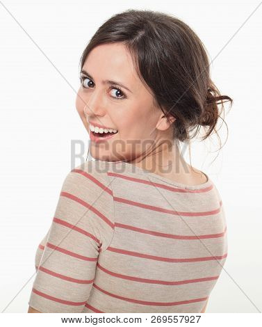 Happy Young Brunette Posing Side To Camera