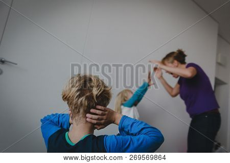 Problems In Family -mother Shouting At Kids, Tired And Exhausted Boy