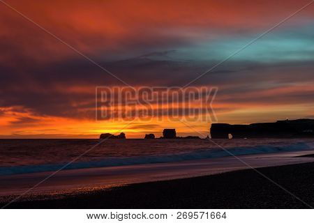 The Sunset Over The Atlantic Ocean In The Vík Beach, Iceland