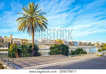 Spain, Andalusia, Seville, The Houses Of The Triana Quarter On The  Guadalquivir Riverbank