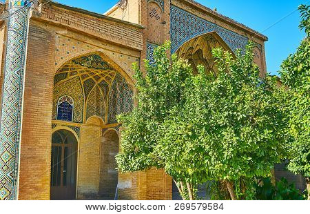 The Richly Decorated Portal (iwan) Of Hafezieh With Scenic Tiled Ornaments, Carved Brick Decorations