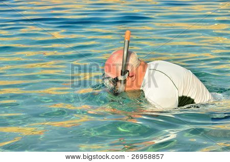 Senior snorkling