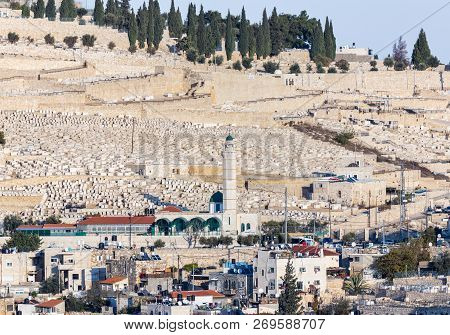 Jerusalem, Israel, November 17, 2018 : The Jewish Cemetery And Ras Al-amud Mosque On The Mount Of Ol