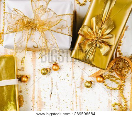 Topv View Of Golden Christmas Gift Boxes