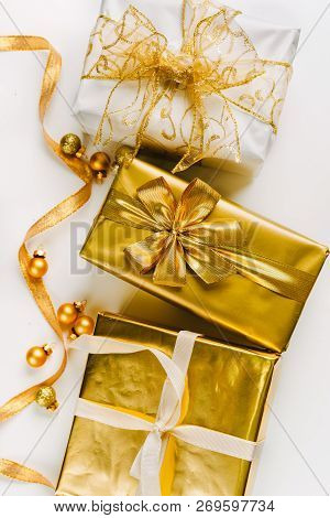 Topv View Of Golden Christmas Gift Boxes