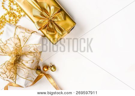 Topv View Of Golden Christmas Gift Boxes