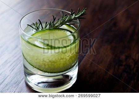Rosemary Gin Gimlet Cocktail With Cucumber Slice.