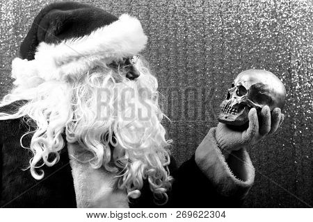 Santa Claus. Santa Preforms Shakespeare's Hamlet in black and white.  Alas, poor Yorick! I knew him well.