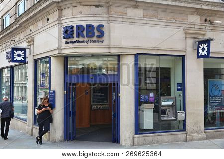 London, Uk - July 7, 2016: Person Waits In Front Of Rbs Royal Bank Of Scotland Branch In London. Rbs