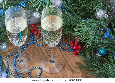 Christmas And New Year Still Life Composition With Two Champaign Glasses, Pine Tree Acerose, Red Row