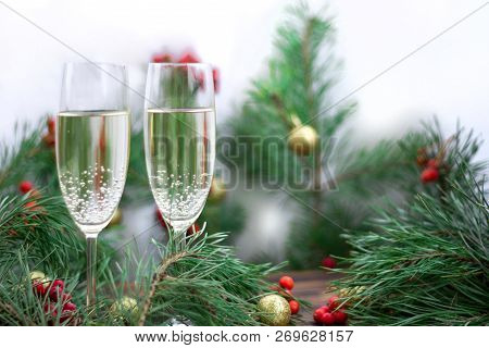 Christmas And New Year Still Life Composition With Two Champaign Glasses, Pine Tree Acerose, Red Row