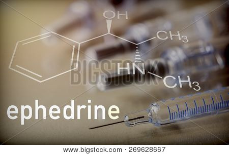 Chemical Composition Of Ephedrine Next To Syringe, Conceptual Image