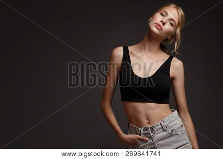 Fashion Model With Long Hair, Perfect Skin Is Posing In Studio For Glamour Test Photo Shoot Showing 