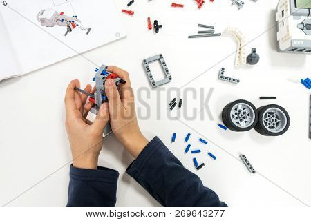 Vilnius, Lithuania - November 16, 2018: Kid Making Lego Robot Mindstorms. Robotic, Learning, Technol