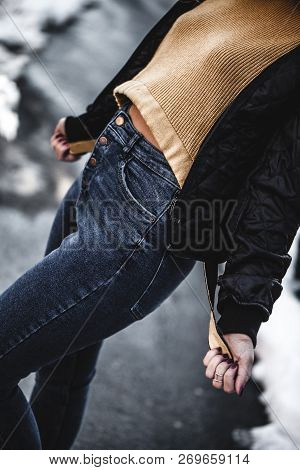 Knee Figure Of Young Beautiful Blonde Straight Hair Woman In The City, One Hand In Pocket - Eyes Clo
