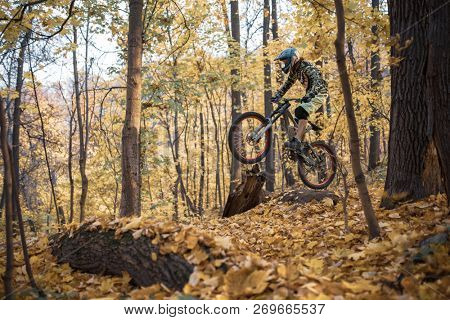 Image of athlete man riding sports bike on track