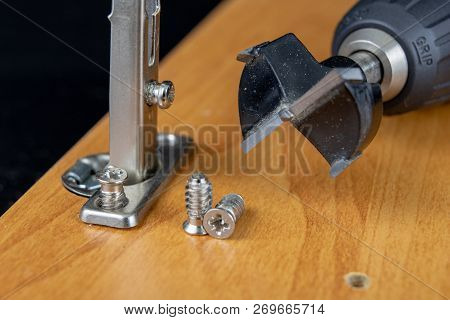 Installation Of Chipboard Furniture In A Carpentry Workshop. Accessories And Tools For Carpenters.