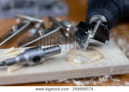 Installation Of Chipboard Furniture In A Carpentry Workshop. Accessories And Tools For Carpenters.