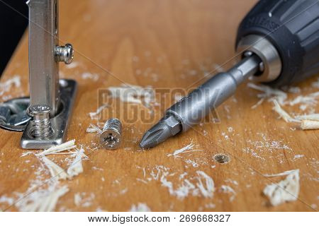 Installation Of Chipboard Furniture In A Carpentry Workshop. Accessories And Tools For Carpenters.