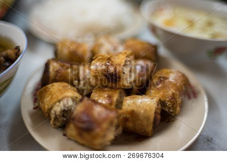 Traditional Vietnamese Fried Springrolls On A Plate. Asian Food Background. Selective Focus, Shallow