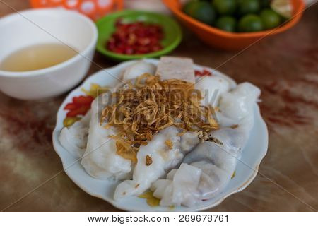 Traditional Vietnamese Banh Coun Street Food Meal Of Rice Stuffed Pancakes Decorated With Shallot. A