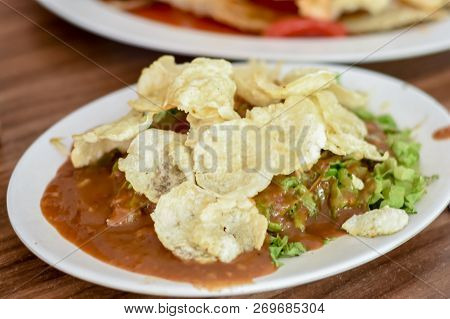 Gado Gado Indonesian Salad With Peanut Sauce On The Table.