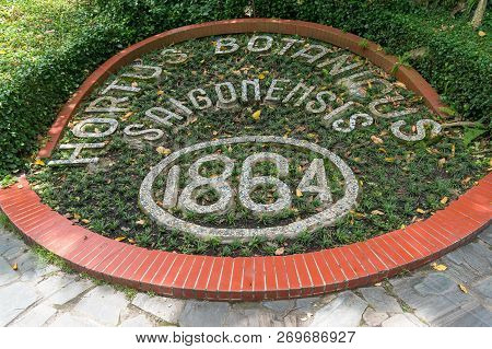 Ho Chi Minh City, Vietnam - August 24, 2017: Ho Chi Ming City Botanical Garden Flowerbed With Establ