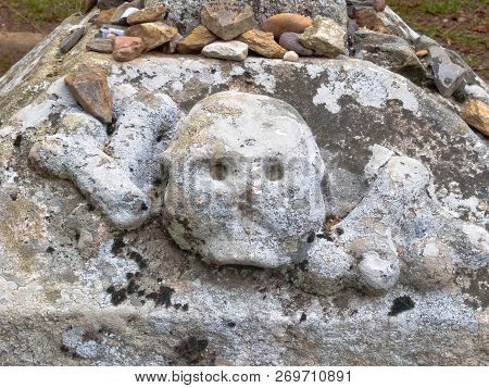 Skull On The Base Of A Stone Cross (cruceiro) - Ligonde, Galicia, Spain