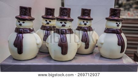 Brussels, Belgium - January 17, 2015: White And Milk Chocolate Snowmen On Display In The Leonidas St