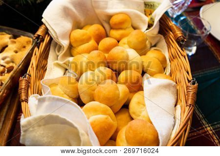 Traditional Mennonite Zwieback Bread Rolls In Basket On Holiday Table