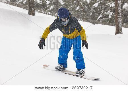 Snowboarding Under The Snow. Ski Slope. White Winter Mountain Landscape