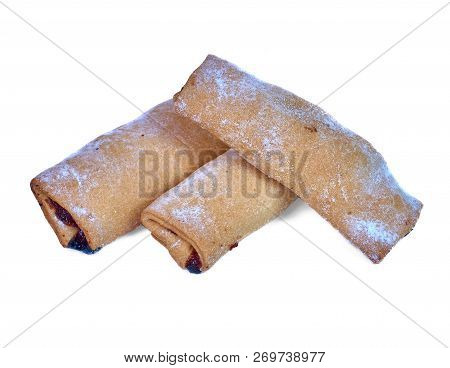 Cookies Rolled With Cherries And Black Currants Isolated On A Wh