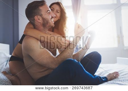 Expression Of Passionate Lovemaking With Beautiful Couple