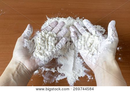 Hands Dirty With White Flour After Preparing.
