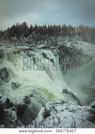 Biggest Frozen Swedish Waterfall Tannforsen In Winter Time