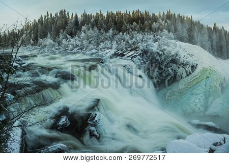 Biggest Frozen Swedish Waterfall Tannforsen In Winter Time