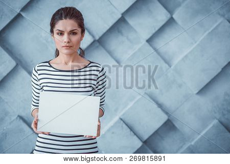 Upset Good-looking Female Holding Clear White Poster