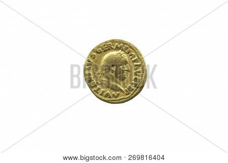 Gold Coin Depicting The Roman Emperor Vitellius. Isolated Over White