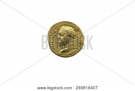 Gold Coin Depicting The Roman Emperor Vitellius. Isolated Over White