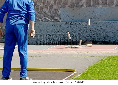 Gorodki - A Russian Folk Sports Game. In This Game You Need Specific Distances To Smash Figures Made