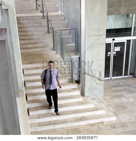 Beer Sheva,  Israel - June 11, 2011:  Young Man Comes Down The Stairs In The Modern Building In Univ