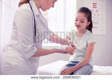 Dark-haired Little Girl Coming To Doctor After Breaking Her Arm