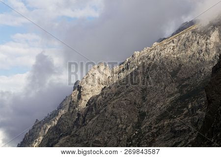 Mountains With Clouds In The Restonica Valley In Corsica