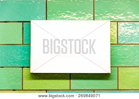 White Rectangular Panel With Copyspace On A Tiled Wall